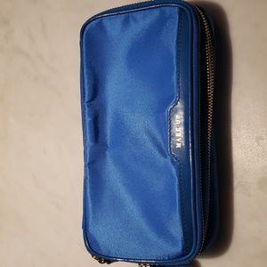 Anya Hindmarch blue logo makeup pouch